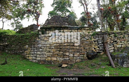 The remains of stone round houses inside the lost city of ancient Kuelap fortress, archaeological site in Amazonas region of Peru, South America Stock Photo