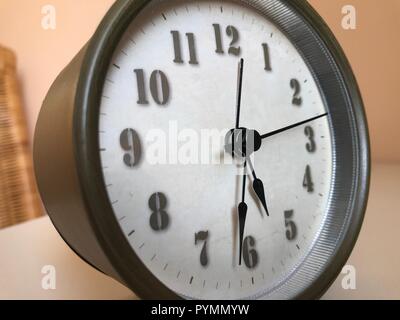 traditional round alarm clock with hands Stock Photo