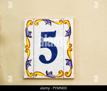 08 08 2108 Atri, Italy - traditional ceramic house plate number 5 on home wall Stock Photo