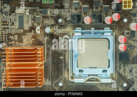 The components of the motherboard. Include chip, ic, cpu socket, heatsink and many port. Stock Photo