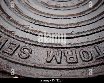 Manhole cover for storm sewer Stock Photo