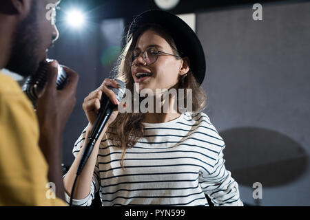 Young Woman Singing Stock Photo