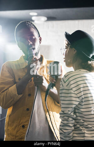 Couple of Singers Stock Photo