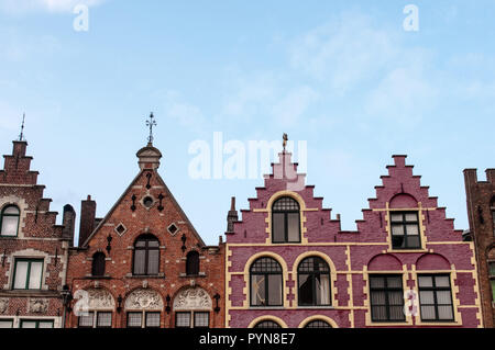 A view of the famous and colorful Flemish houses in the Market square (The Markt ) of Bruges, West Flanders, Belgium, Europe