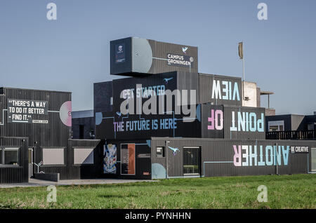 groningen, NETHERLANDS - October 14, 2018: Special design buidlings made of containers. With some insirational texts on it. Stock Photo