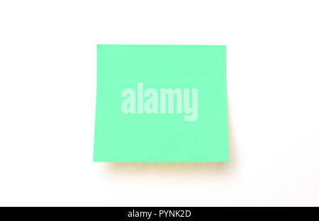 Green sticky note isolated on a white background Stock Photo