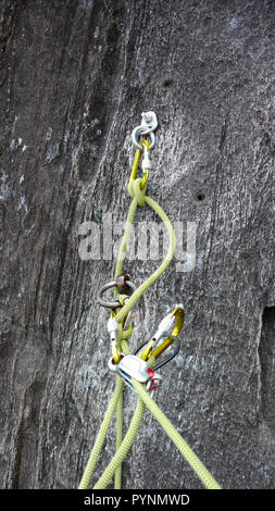 Stanage Top Rope Rock climbing belay and safety anchor ropes fixed at the top of a crag ...