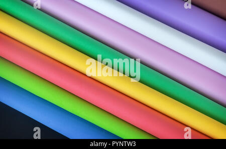 Folded sheets of paper in different colors. Stock Photo
