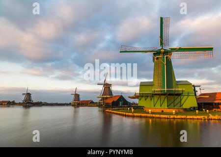 Well-preserved historic windmills in Zaanse Schans near Zaandam Stock Photo