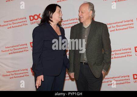 Leipzig, Germany. 29th Oct, 2018. Festival director Leena Pasanen and German director Werner Herzog in the CineStar cinema on the occasion of the opening of the 61st documentary film festival DOK Leipzig. The motto of the event will be 'Demand the impossible!' and 306 films from 50 countries will be shown from 29 October to 04 November 2018. Credit: Sebastian Kahnert/dpa-Zentralbild/dpa/Alamy Live News Stock Photo