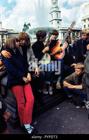 Hippies in Trafalgar Square, London during the late 1960s Colin Maher/Simon Webster Stock Photo