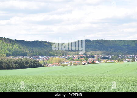 Spring in Reimsbach in the year 2018 viewed from the from the southwest direction towards the town. Frùhling in Reimsbach in dem Jahr 2015. Stock Photo
