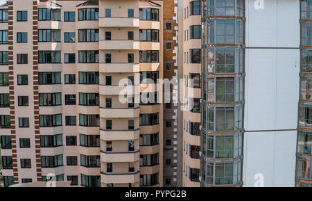 Facade work and insulation of a multistory building. Stock Photo