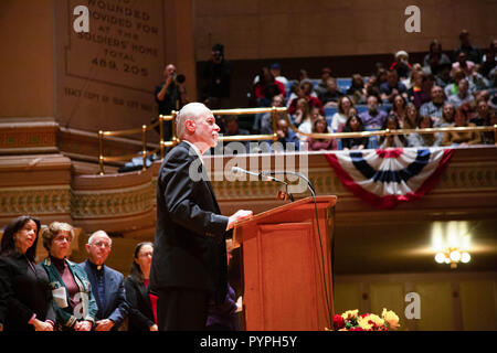 Rabbi Jeffrey Myers of the Tree of Life/Or L'Simcha Congregation giving a chilling description of the mass shooting which occurred in the synagogue.  In Pittsburgh, Pennsylvania, thousands came together to mourn the loss of the Tree of Life synagogue shooting in Squirrel Hill where 11 congregants were killed and six injured. The deadliest attack on Jews in the history of the United States. Interfaith leaders joined the thousands to show their solidarity and voice out their love and unity for all people regardless of race and religion. The vigil was held at the Soldiers & Sailors Memorial Hall  Stock Photo