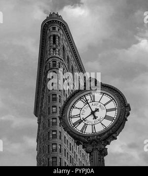 Flatiron Building with 5th Ave Clock Stock Photo