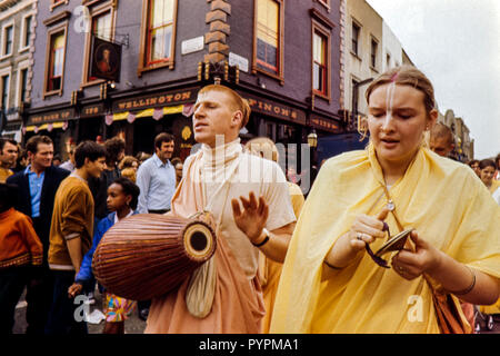 Hare Krishna's parading along Portabello Road , London during the 1960s Colin Maher/Simon Webster Stock Photo