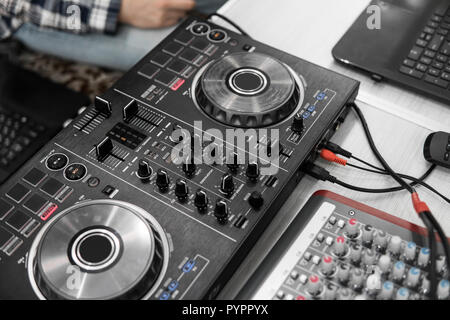 DJ remote control. Dj audio controller. Electronic turntable. Stock Photo