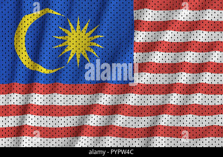 Malaysia flag printed on a polyester nylon sportswear mesh fabric with some folds Stock Photo