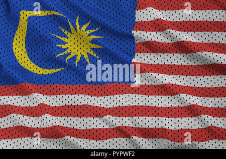 Malaysia flag printed on a polyester nylon sportswear mesh fabric with some folds Stock Photo