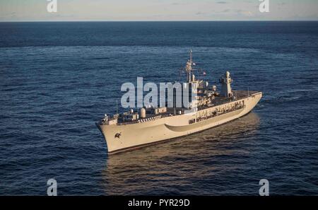 181028-N-KA046-0500    NORWEGIAN SEA (Oct. 28, 2018) – The Blue Ridge-class command and control ship USS Mount Whitney (LCC 20) transits the Norwegian Sea during the NATO  Exercise Trident Juncture 18, Oct. 28, 2018. Mount Whitney, forward-deployed to Gaeta, Italy, operates with a combined crew of U.S. Navy Sailors and Military Sealift Command civil service mariners. (U.S. Navy photo by Mass Communication Specialist 2nd Class James R. Turner/Released) Stock Photo