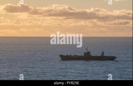 181028-N-KA046-0109    NORWEGIAN SEA (Oct. 28, 2018) – The Blue Ridge-class command and control ship USS Mount Whitney (LCC 20) transits the Norwegian Sea during the NATO  Exercise Trident Juncture 18, Oct. 28, 2018. Mount Whitney, forward-deployed to Gaeta, Italy, operates with a combined crew of U.S. Navy Sailors and Military Sealift Command civil service mariners. (U.S. Navy photo by Mass Communication Specialist 2nd Class James R. Turner/Released) Stock Photo