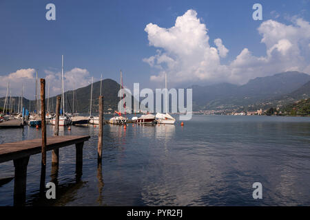 Boats moored on Lake Iseo in northern Italy Stock Photo