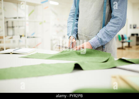 Working with fabric in atelier Stock Photo
