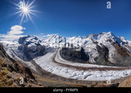 Swiss Alps with glaciers against blue sky, Zermatt area, Switzerland Stock Photo