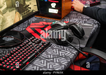 MOSCOW, RUSSIA - OCTOBER 27 2018: EPICENTER Counter Strike: Global Offensive esports event. Keyboard, headphones, mouse, computer devices for playing video games for gamers. Stock Photo
