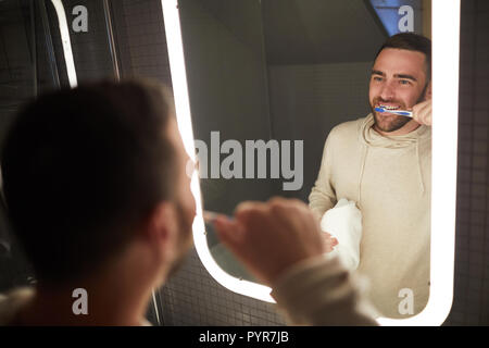 Man Brushing Teeth Stock Photo