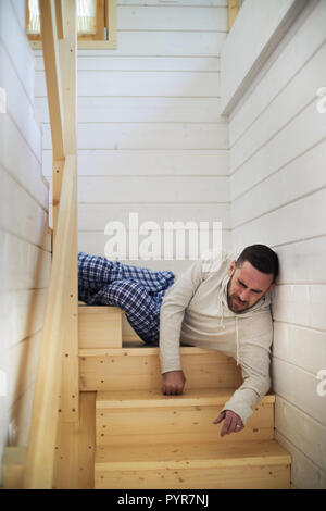 Man Falling Down Stairs Stock Photo