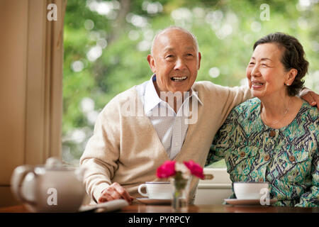 Happy senior couple inside their home. Stock Photo