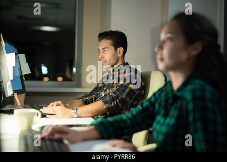 People Using Computers in Office Stock Photo