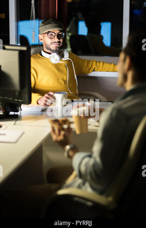 Web Designers Working at Night Stock Photo