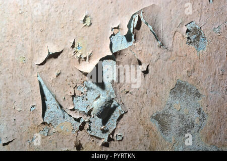 close up background and texture of peeling paint on pastering wall because moisture of water Stock Photo