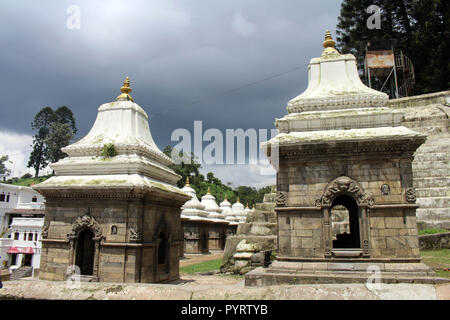 Dozens or hundreds of small temples across Bagmati River of Pashupatinath in Kathmandu. Taken in Nepal, August 2018. Stock Photo