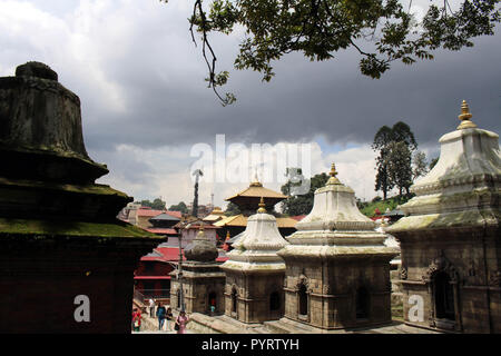 Dozens or hundreds of small temples across Bagmati River of Pashupatinath in Kathmandu. Taken in Nepal, August 2018. Stock Photo