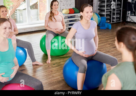 Group of Pregnant Women Enjoying Fitness Stock Photo