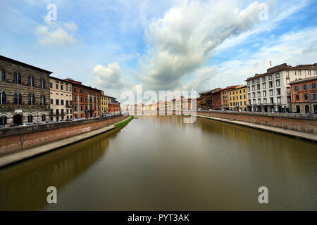 The old city of Pisa as seen from the Di Mezzo bridge over the Arno river. Stock Photo