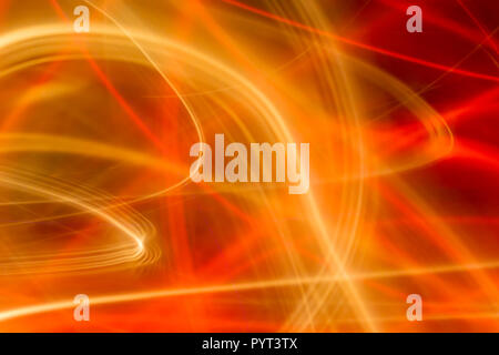Blurred red, orange and yellow lines and curves. Abstract background, wallpaper. Stock Photo