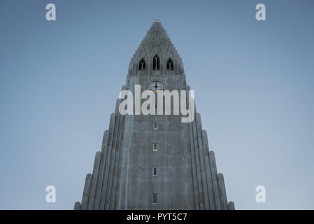 Tower of Hallgrimskirkja church, Reykjavik against blue sky Stock Photo