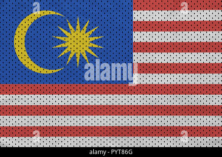 Malaysia flag printed on a polyester nylon sportswear mesh fabric with some folds Stock Photo