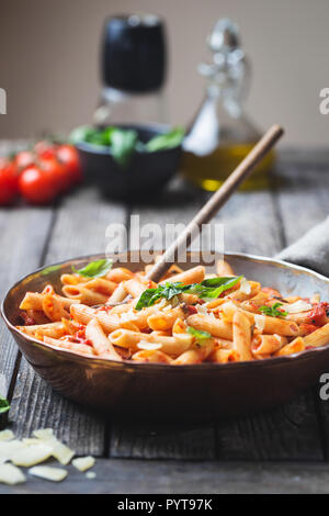 Penne pasta in tomato sauce Stock Photo