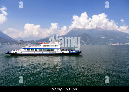Ferry approaching the harbour at Varenna on Lake Como, Italy Stock Photo
