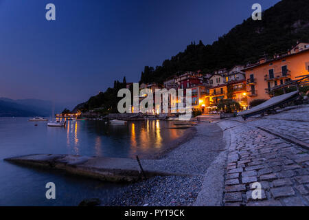Varenna waterfront at dusk on Lake Como in northern Italy Stock Photo