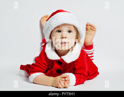 Cute baby in santa hat. Christmas child Stock Photo
