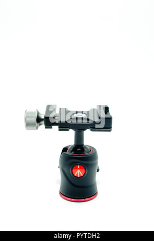 Largs, Scotland, UK - October 25, 2018: Manfrotto tripod ball head with generic converted Arca- Swiss mounting plate. Stock Photo