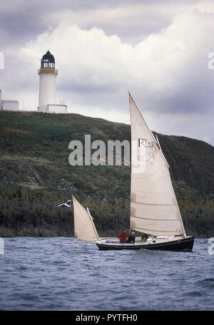 Sailing yacht Speedwell, a Romilly 23, south of Little Ross Island lighthouse in the Solway Firth, Dumfries and Galloway Stock Photo