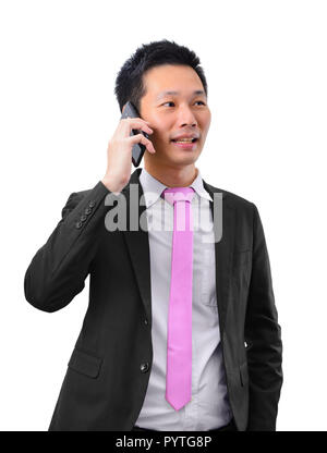Asian businessman talking on the phone Stock Photo