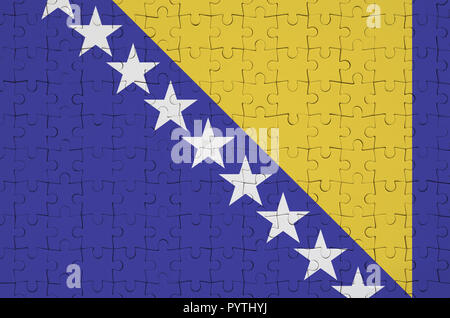 Bosnia and Herzegovina flag  is depicted on a folded puzzle Stock Photo